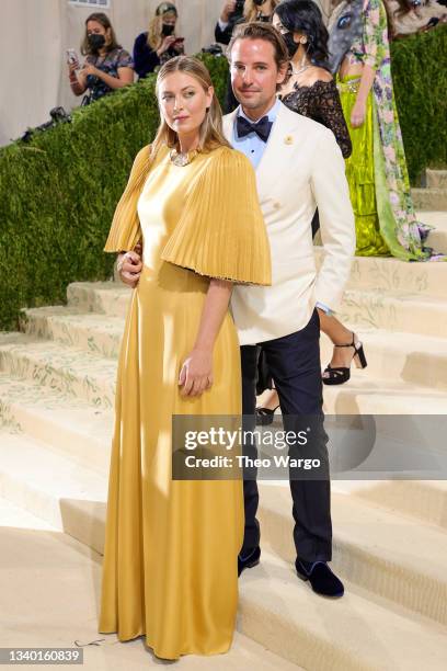 Maria Sharapova and Alexander Gilkes attend The 2021 Met Gala Celebrating In America: A Lexicon Of Fashion at Metropolitan Museum of Art on September...