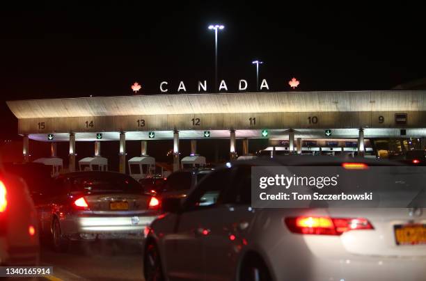 Cars line up at the Canadian border with the United States after getting off the Peace Bridge on December 30, 2012 in Buffalo, New York. Ahead are...