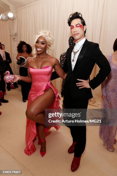 Jackie Aina and Eugene Lee Yang attend The 2021 Met Gala Celebrating In America: A Lexicon Of Fashion at Metropolitan Museum of Art on September 13,...