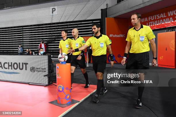 Referees enter the pitch during the FIFA Futsal World Cup 2021 group D match between Panama and Czech Republic at Klaipeda Arena on September 13,...