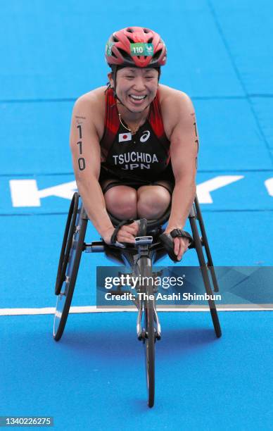 Wakako Tsuchida of Team Japan reacts after competing in the Triathlon Women's PTWC on day 5 of the Tokyo 2020 Paralympic Games at Odaiba Marine Park...