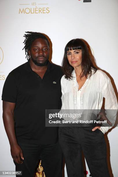 Sly Johnson and Mathilda May attend the Molieres Dinner at "InterContinental Paris le Grand" Hotel on September 13, 2021 in Paris, France.