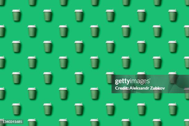 seamless pattern of a disposable cup. takeaway coffee mug pattern on pastel green background. take a break. - coffe print stock pictures, royalty-free photos & images