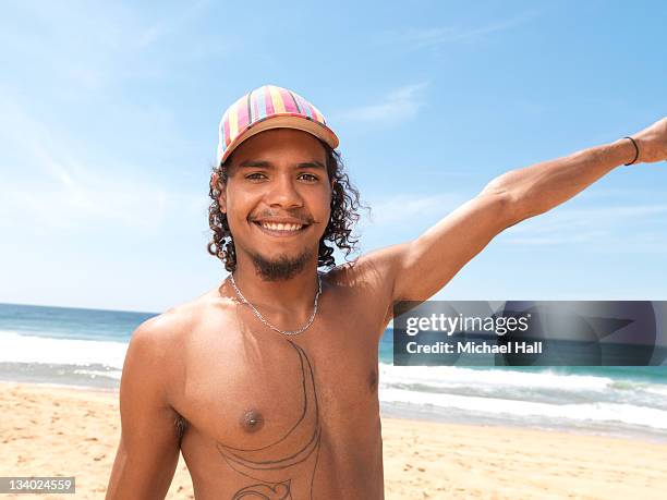 aboriginal boy at beach - guy pointing stock pictures, royalty-free photos & images