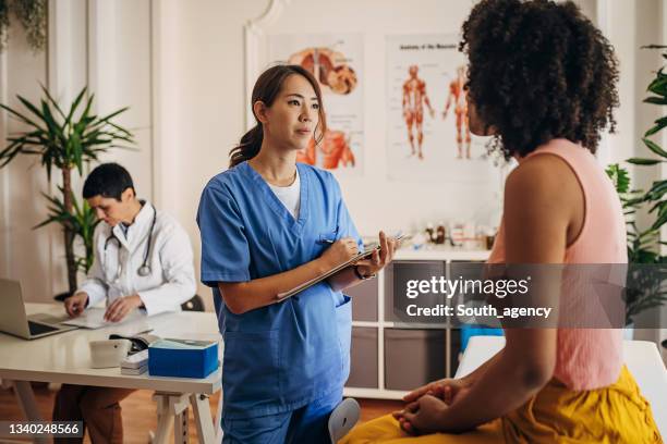 Nurses Medical Chart 381 Female Nurse With Chart Stock Photos, High-Res Pictures, and Images ...