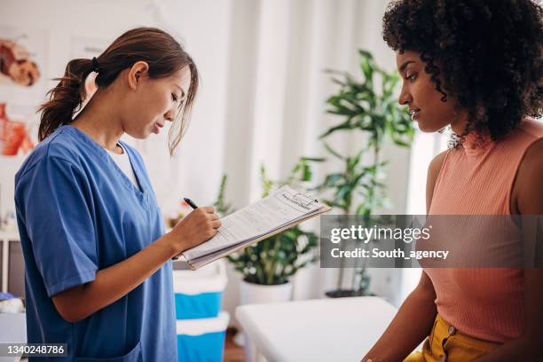 Nurses Medical Chart 382 Female Nurse With Chart Stock Photos, High-Res Pictures, and Images ...