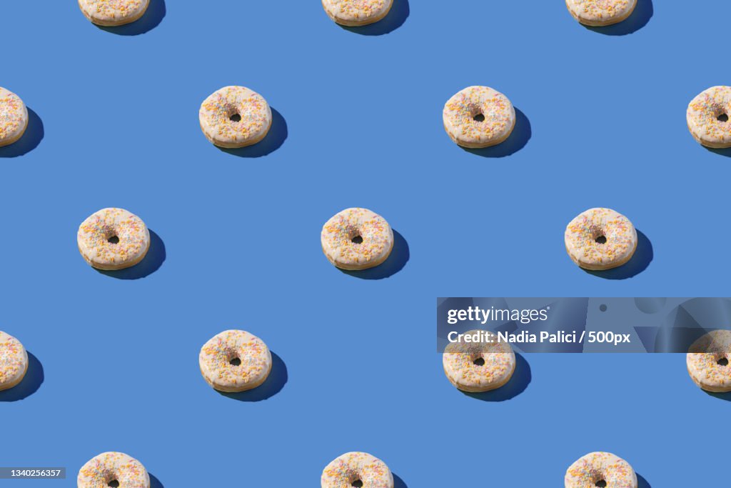 Full frame shot of mushrooms against blue background