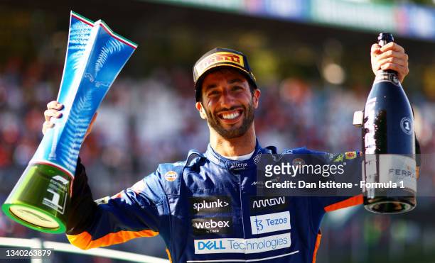 Daniel Ricciardo of Australia and McLaren celebrates on the podium after winning the F1 Grand Prix of Italy at Autodromo di Monza on September 12,...
