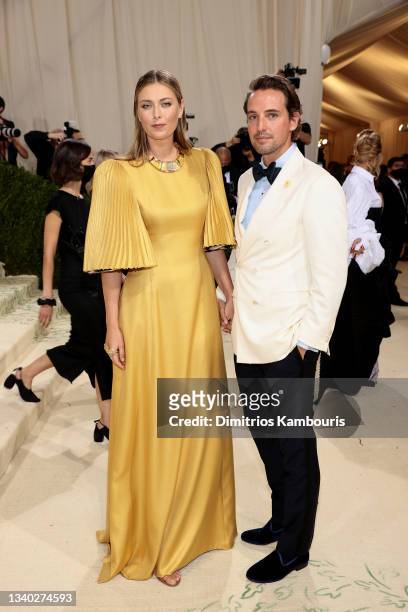 Maria Sharapova and Alexander Gilkes attend The 2021 Met Gala Celebrating In America: A Lexicon Of Fashion at Metropolitan Museum of Art on September...
