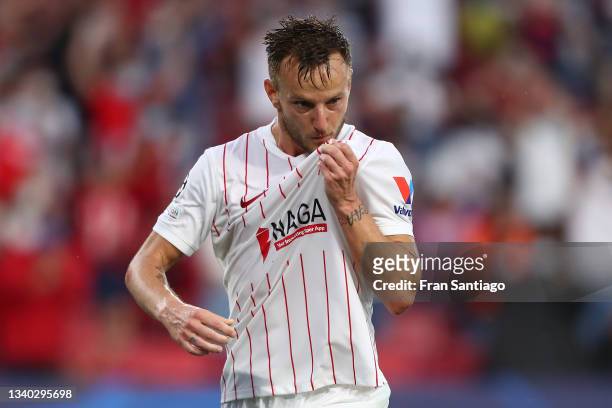 Ivan Rakitic of Sevilla celebrates after scoring their side's first goal during the UEFA Champions League group G match between Sevilla FC and RB...