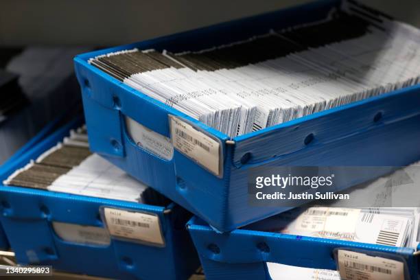 Ballots for the California recall election sit on a shelf at the Santa Clara County registrar of voters office on September 14, 2021 in San Jose,...