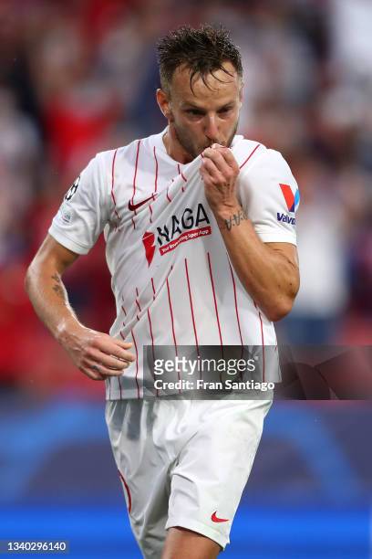 Ivan Rakitic of Sevilla celebrates after scoring their side's first goal during the UEFA Champions League group G match between Sevilla FC and RB...