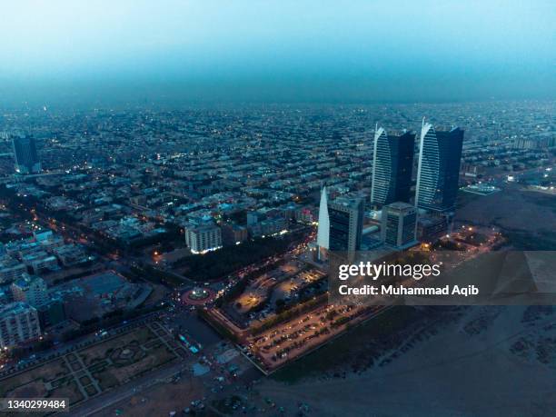 aerial view of karachi cityscape at night - karachi stock pictures, royalty-free photos & images
