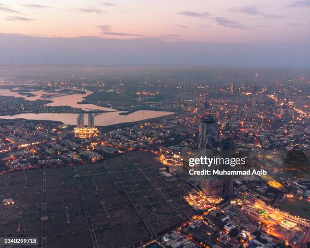 aerial view of karachi cityscape at night - karachi ストックフォトと画像