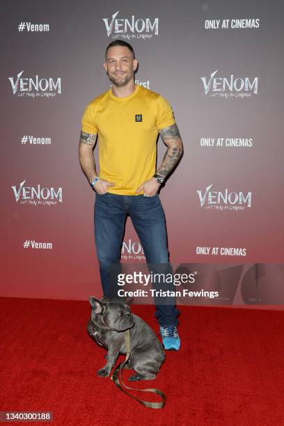 Tom Hardy and his dog Blue attend the fan screening of "Venom: Let There Be Carnage" at Cineworld Leicester Square on September 14, 2021 in London,...