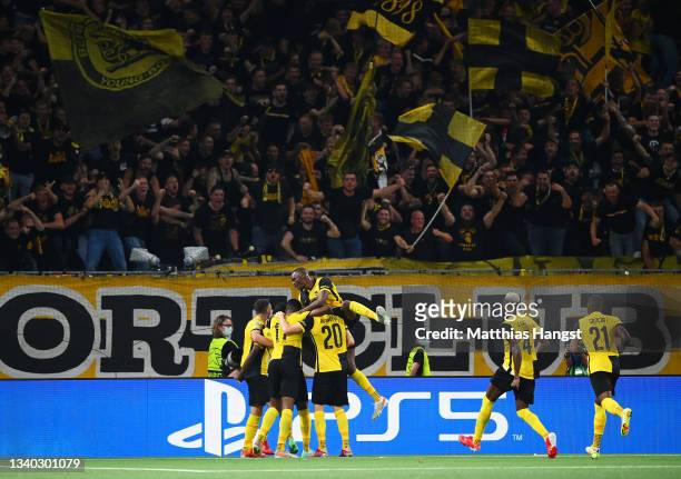 Nicolas Moumi Ngamaleu of Young Boys celebrates with teammates after scoring their side's first goal during the UEFA Champions League group F match...