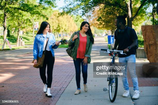 diverse group of college students on campus - community college campus stock pictures, royalty-free photos & images