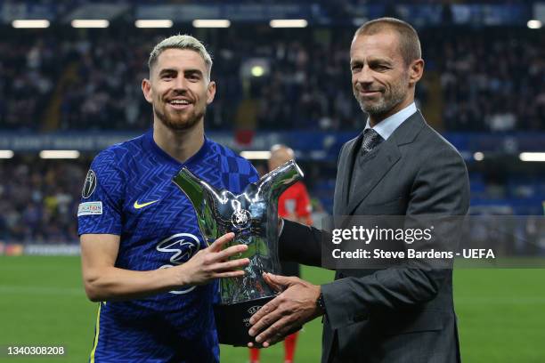 President, Aleksander Ceferin presents Jorginho of Chelsea with the Men's player of the year award 2020/2021 prior to the UEFA Champions League group...