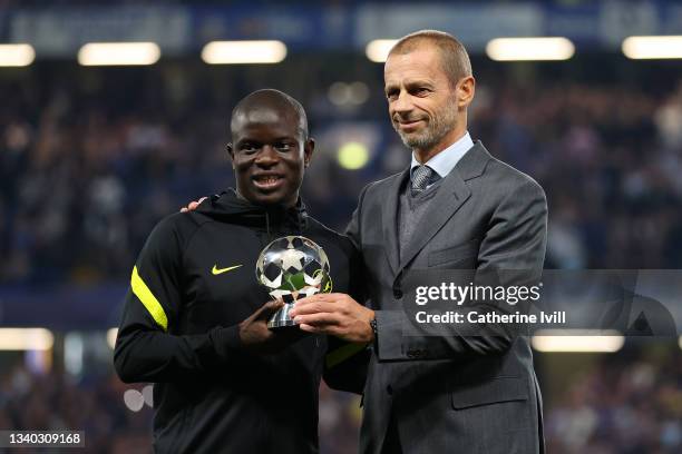 President, Aleksander Ceferin presents N'golo Kante of Chelsea with the Midfielder of the year award 2020/2021 prior to the UEFA Champions League...