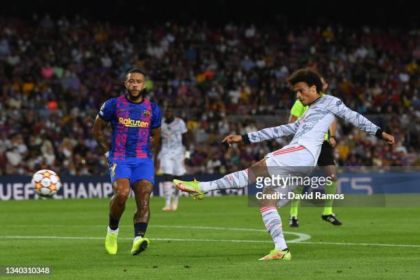 Leroy Sane of Bayern Munich takes a shot during the UEFA Champions League group E match between FC Barcelona and Bayern Muenchen at Camp Nou on...