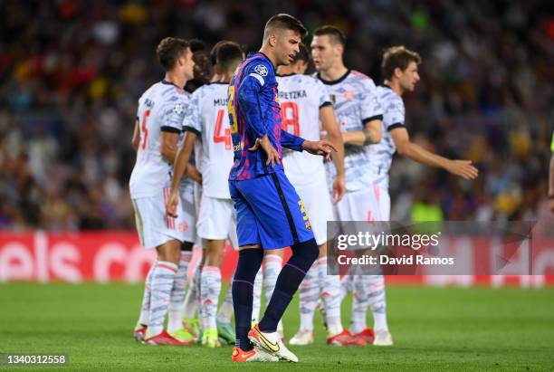 Gerard Pique of Barcelona reacts after conceding their side's first goal scored by Thomas Muller of Bayern Munich during the UEFA Champions League...