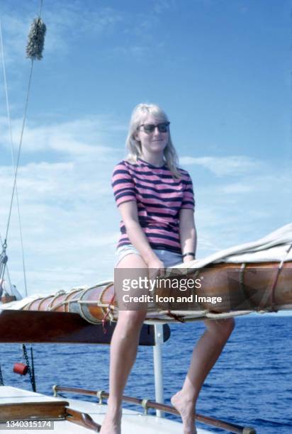 Cynthia Lennon , the wife of Beatle John Lennon, enjoys her time on a sailboat while on vacation in Papeete, Tahiti in French Polynesia, May 1964.