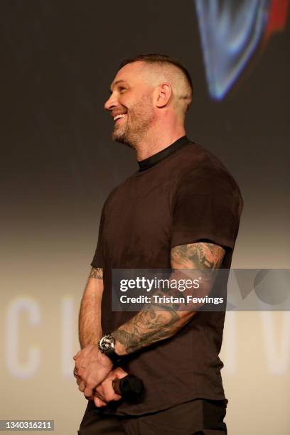 Tom Hardy on stage at the fan screening of "Venom: Let There Be Carnage" at Cineworld Leicester Square on September 14, 2021 in London, England.