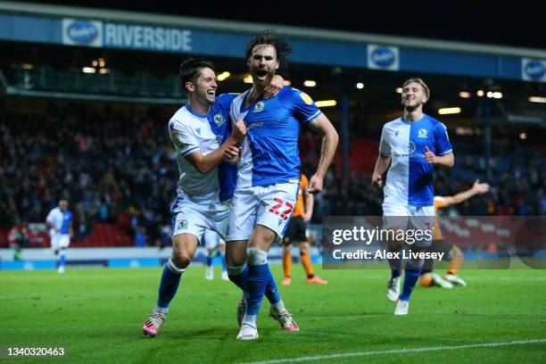 Ben Brereton of Blackburn Rovers celebrates with team mate Lewis Travis after scoring their team's second goal during the Sky Bet Championship match...
