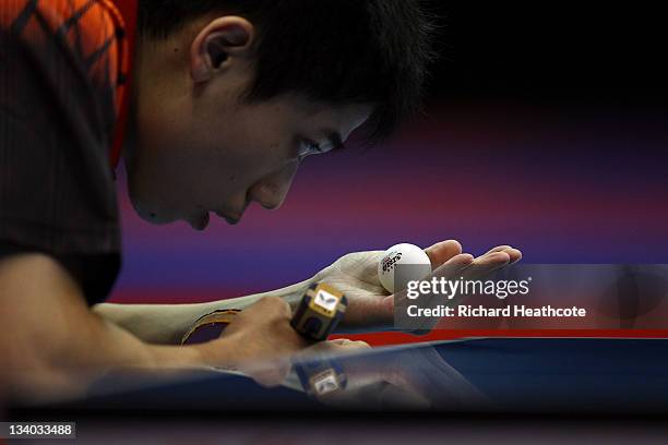 Tzu-Hsiang Hung of Chinese Taipei prepares to serve to Darius Knight of England in a preliminary group match during the ITTF Pro Tour Table Tennis...