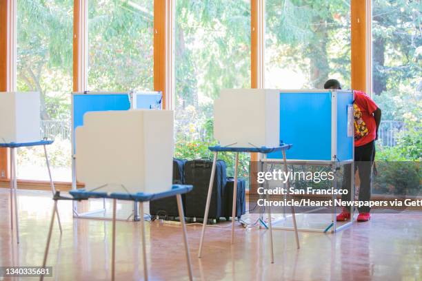 Riley Mitchell, an Oakland resident, cast his ballot in the recall election in Oakland, Calif., on Tuesday, September 14, 2021. The 2021 California...