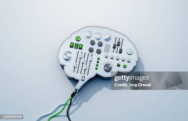 controls on a brain-shaped device - ボリュームノブ ストックフォトと画像