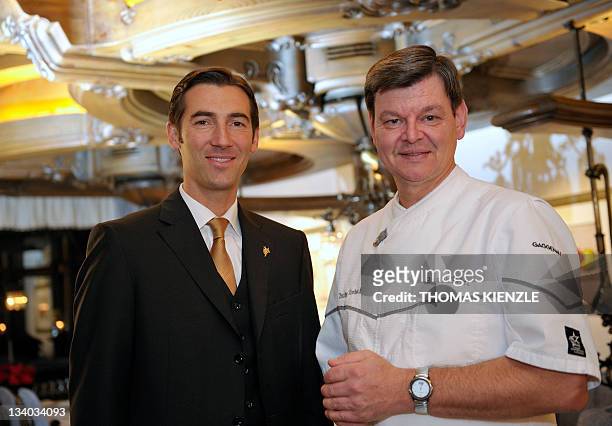 Chef Harald Wohlfahrt , and his sommelier Stephane Gass pose in the restaurant Schwarzwaldstube in the hotel Traube Tonbach in Baiersbronn in the...