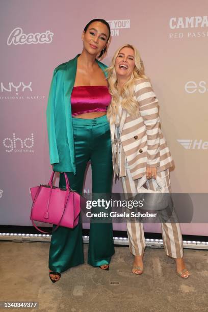 Verona Pooth and Jennifer Knaeble attends the Guido Maria Kretschmer show during the ABOUT YOU Fashion Week Autumn/Winter 21 at Kraftwerk on...