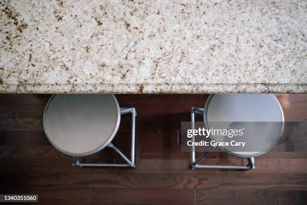 steel counter stools at kitchen island - kitchen bench from above stock-fotos und bilder