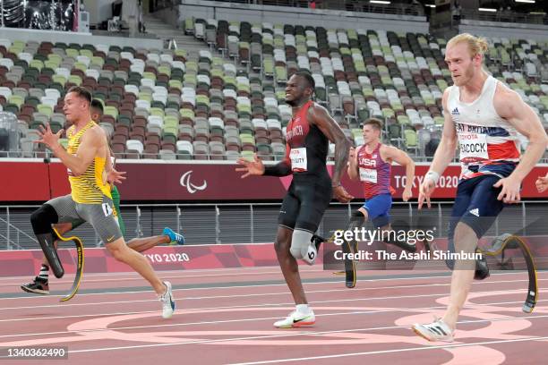 Felix Streng of Team Germany, Sherman Isidro Guity Guity of Team Costa Rica and Jonnie Peacock of Team Great Britain compete in the Athletics Men's...