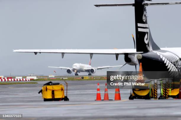 An Emirates plane carrying Pfizer vaccines from Denmark touches down at Auckland International Airport. On September 15, 2021 in Auckland, New...