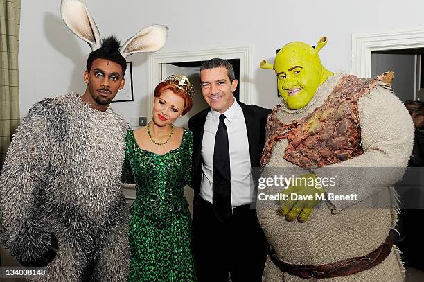 Actor Antonio Banderas poses with the cast members Richard Blackwood, Kimberley Walsh and Nigel Lindsay of 'Shrek The Musical' at a photocall to...