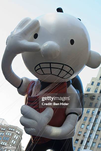 The balloon of Diary of a Wimpy Kid floats in Macy's Legendary Thanksgiving Day Parade on November 24, 2011 in New York City.