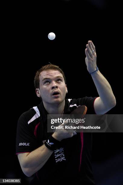 Paul Drinkhall of England serves to Hao Wang of China in the Men's Singles during the ITTF Pro Tour Table Tennis Grand Finals at the ExCel on...