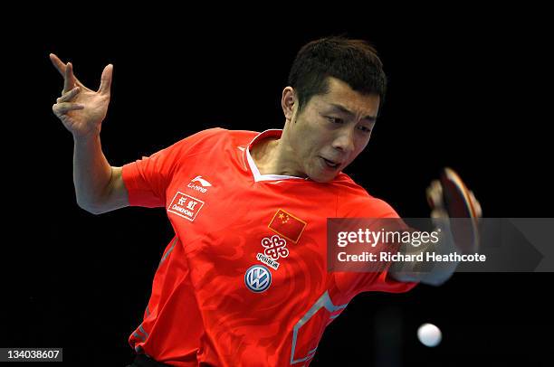 Xin Xu of China in action against Se Hyuk Joo of Korea during the ITTF Pro Tour Table Tennis Grand Finals at the ExCel on November 24, 2011 in...