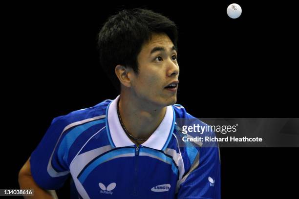 Se Hyuk Joo of Korea serves against Xin Xu of China in the Men's Singles during the ITTF Pro Tour Table Tennis Grand Finals at the ExCel on November...
