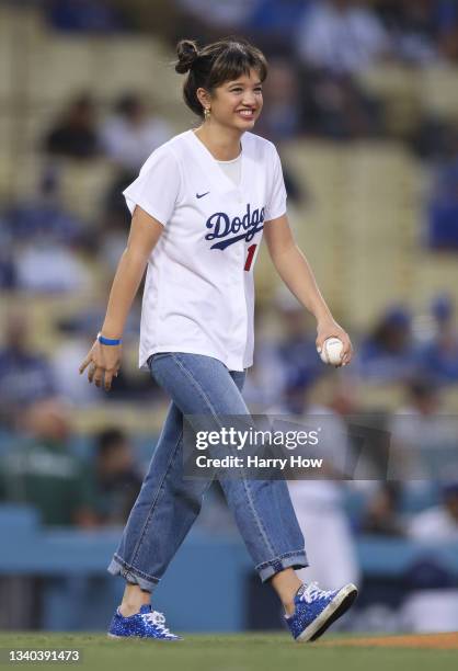 Actress Peyton Elizabeth Lee throws out a ceremonial first pitch before the game between the Arizona Diamondbacks and the Los Angeles Dodgers at...