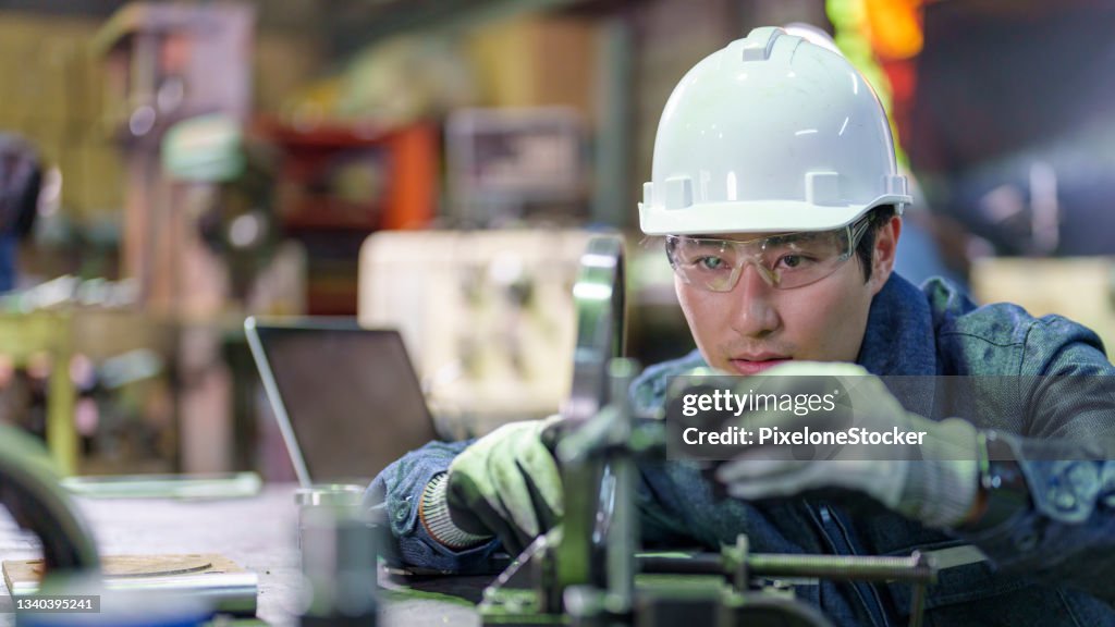 Man Using Precision Tools Man Using Dial Indicator For Precision Alignment During Work ...