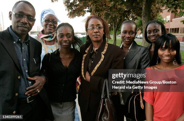 Suffolk University student commencement speaker and Magna Cum Laude graduate Mame-Oumy Mbengue stands for a photo with her family who are in town...