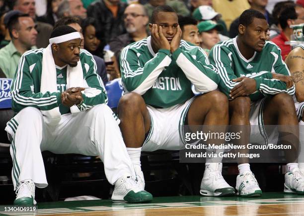 Boston Celtics guard Bill Walker, forward Glen Davis and guard Tony Allen on the bench in the fourth quarter of Game 7 of the Eastern Conference...