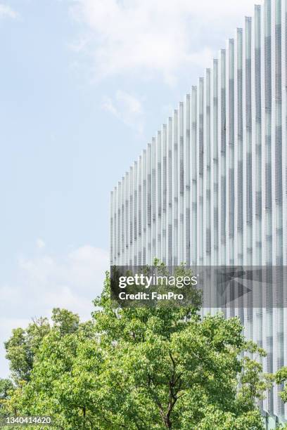 bottom view of modern green city - building bottom view stock pictures, royalty-free photos & images
