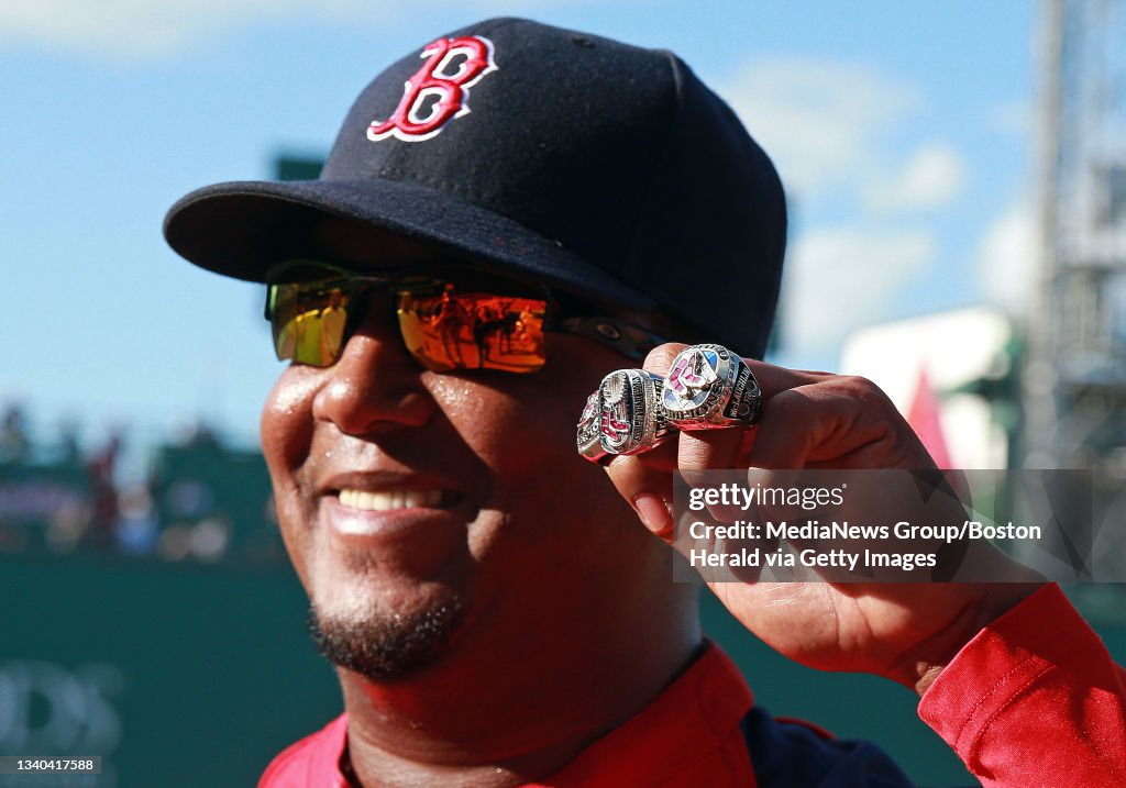 Fenway Raffle Red Sox great Pedro Martinez models three World Series rings to... News ...