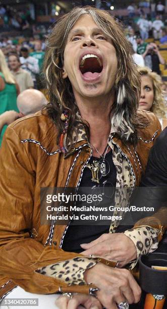 Steven Tyler with his girlfriend Erin Brady before the first quarter as the Celtics take on the Lakers in Game 6 of the NBA Finals at the Boston...