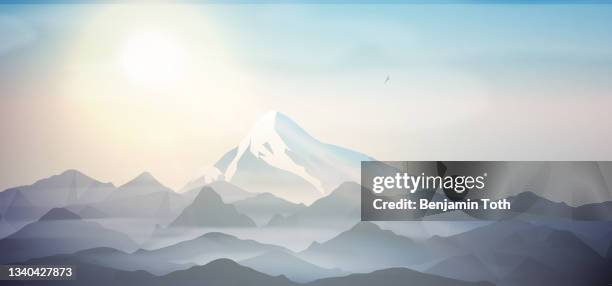 mountains in a morning fog - high level summit stock illustrations