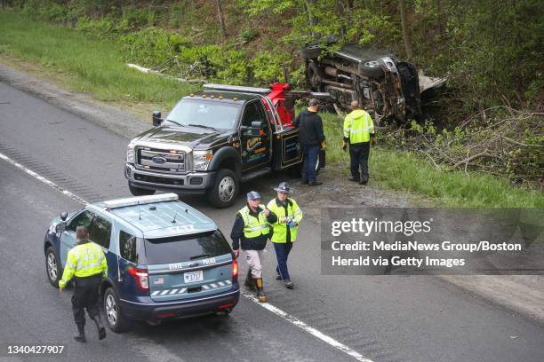 Massachusetts State Police investigate a serious rollover crash on I-495 northbound in Merrimac on Monday, May 22, 2017. Staff photo by Nicolaus...